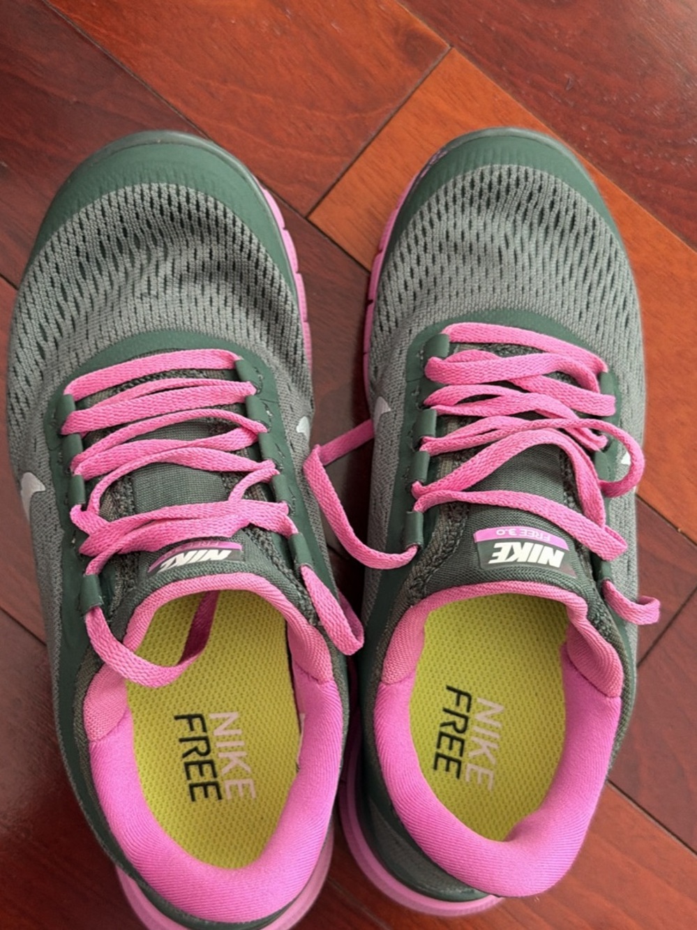 Nike Women's Olive Green Running Shoes with Pink Accents
